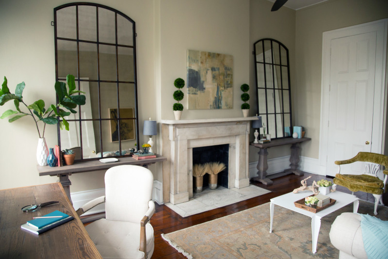 Create the feel of windows with large mirrors. Photo via Laurel & Wolf. 
